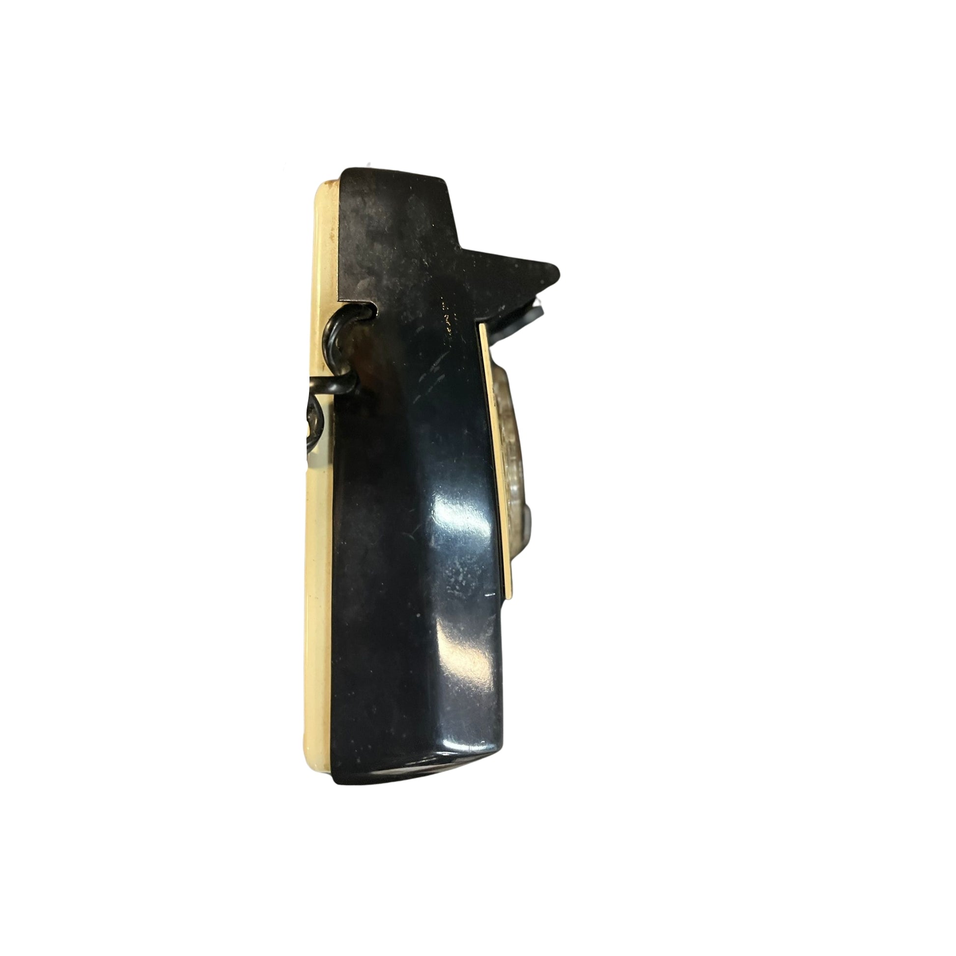 "Get ready to dial back to the past with this funky Vintage MCM Wall Rotary Phone in sleek black. It's a total conversation starter (pun intended), guaranteed to make your friends green with phone envy. Time to get your old school swag on!"