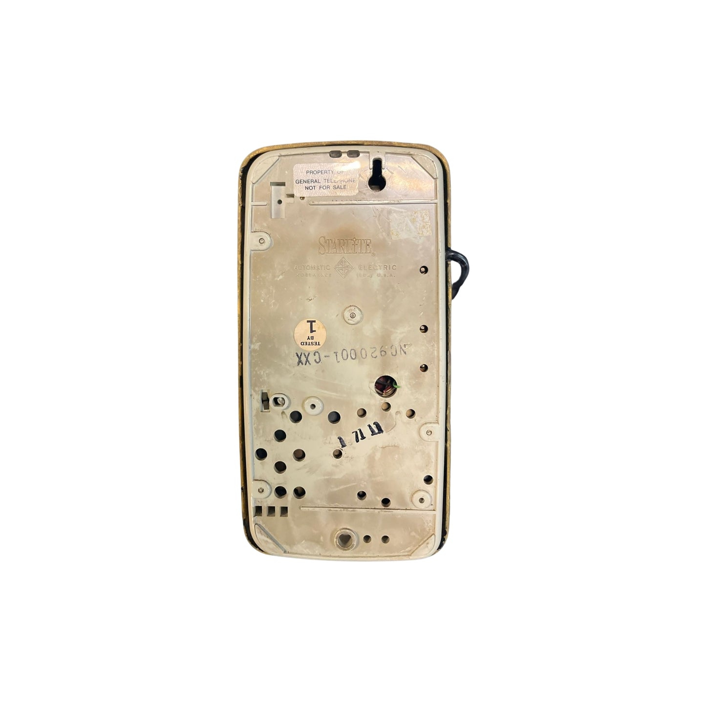 "Get ready to dial back to the past with this funky Vintage MCM Wall Rotary Phone in sleek black. It's a total conversation starter (pun intended), guaranteed to make your friends green with phone envy. Time to get your old school swag on!"