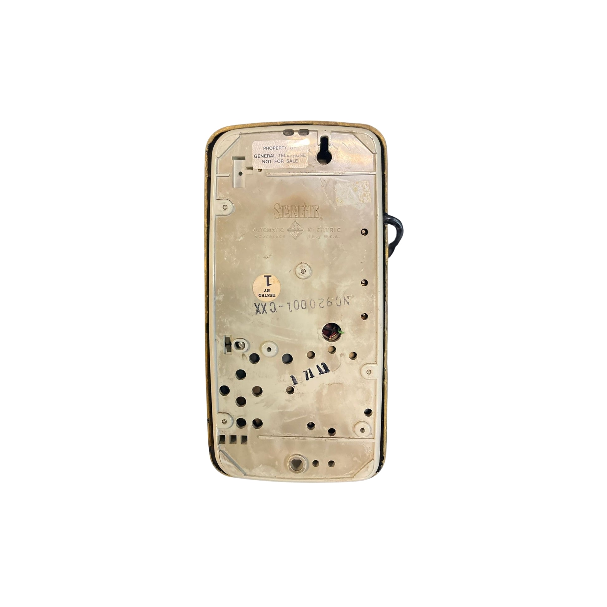 "Get ready to dial back to the past with this funky Vintage MCM Wall Rotary Phone in sleek black. It's a total conversation starter (pun intended), guaranteed to make your friends green with phone envy. Time to get your old school swag on!"