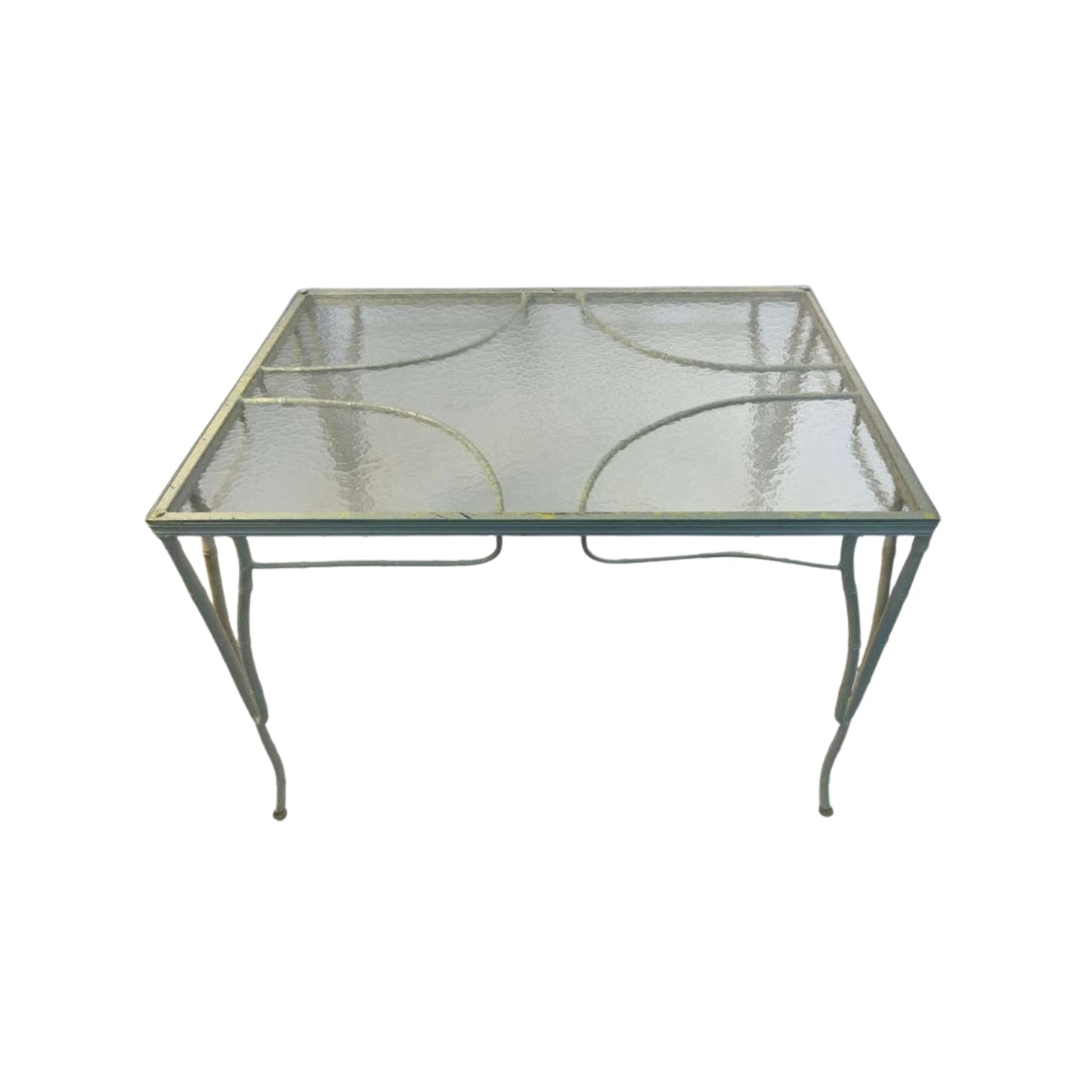 Front view of a 1950s table imitation of cane and bamboo and corrugated glass on a white background