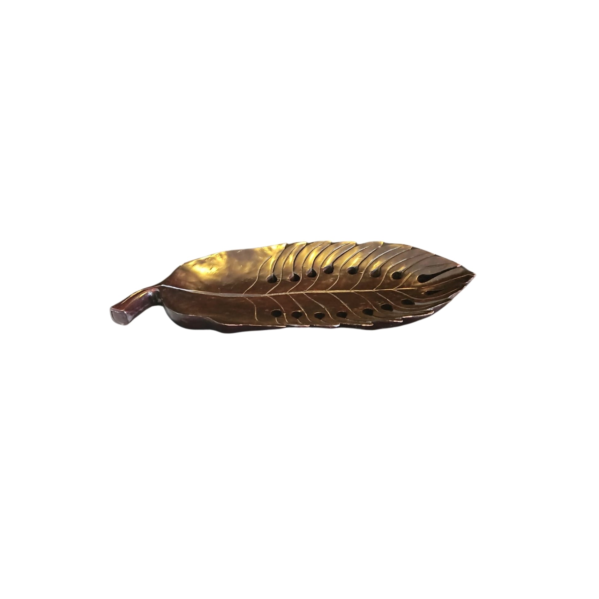 Take a risk and add an organic touch to your home decor with this Philodendron leaf wood carved tray. Made from earthy wood and carved to perfection, this tray is a bold and adventurous addition to any space. Spruce up your home with this unique and natural piece.

Beautifully wood-carved tray in leaf details and mahogany stained, a conversation centerpiece