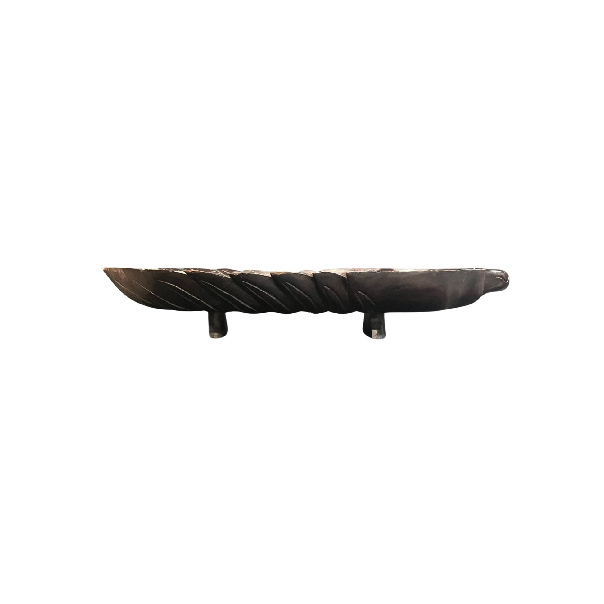 Take a risk and add an organic touch to your home decor with this Philodendron leaf wood carved tray. Made from earthy wood and carved to perfection, this tray is a bold and adventurous addition to any space. Spruce up your home with this unique and natural piece.

Beautifully wood-carved tray in leaf details and mahogany stained, a conversation centerpiece