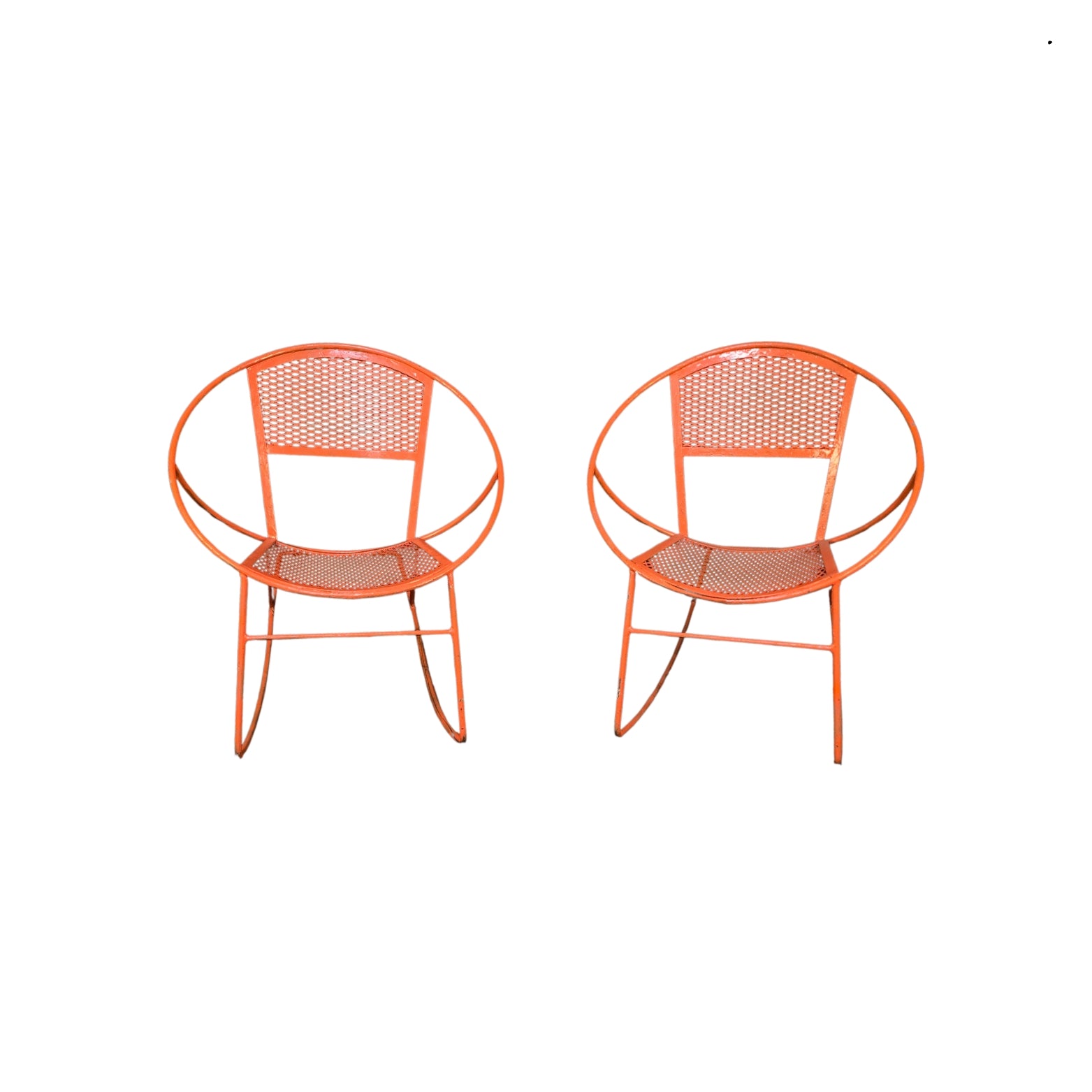 Two orange wrought iron rocking chairs on a white background