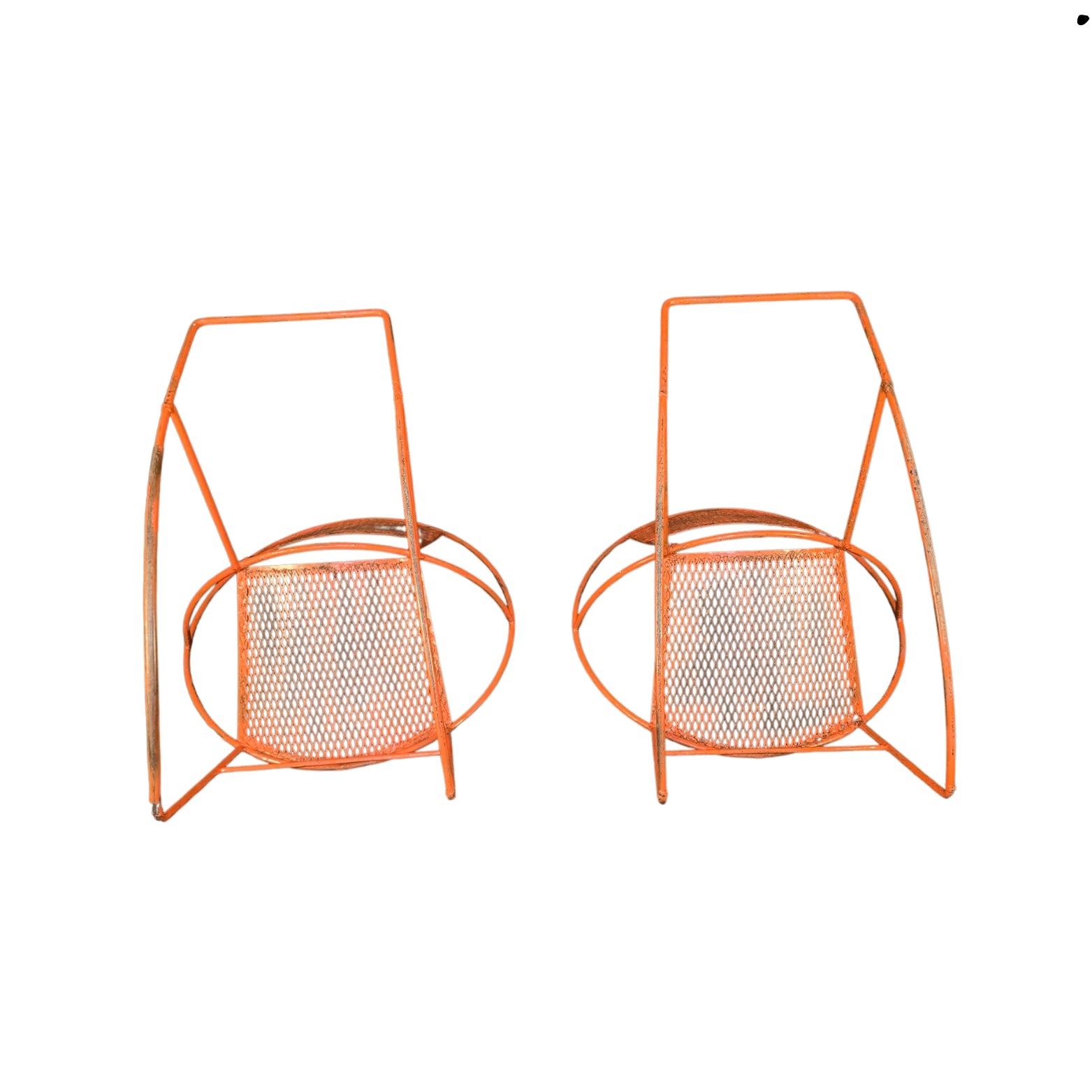 Bottom view of two orange wrought iron rocking chairs on a white background