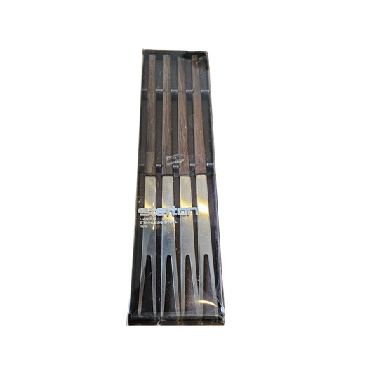 These 4 Stelton Danish fondue forks are made of high-quality stainless steel, perfect for enjoying your favorite hot melted cheeses or sweet chocolate fondues. Their stylish design and Danish craftsmanship will add a touch of elegance to any dining experience. Enjoy a delicious and fun fondue night with these exceptional forks!

Stelton fondue forks with bamboo handles set of 4  