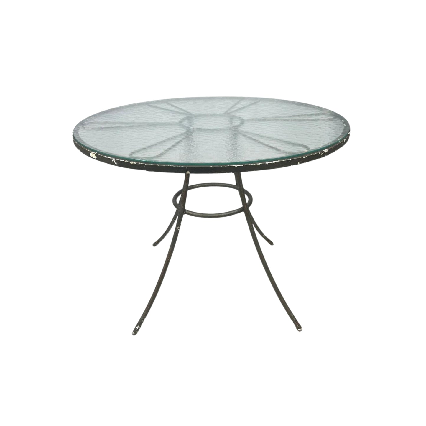 Round wrought iron table top with glass surface on white background