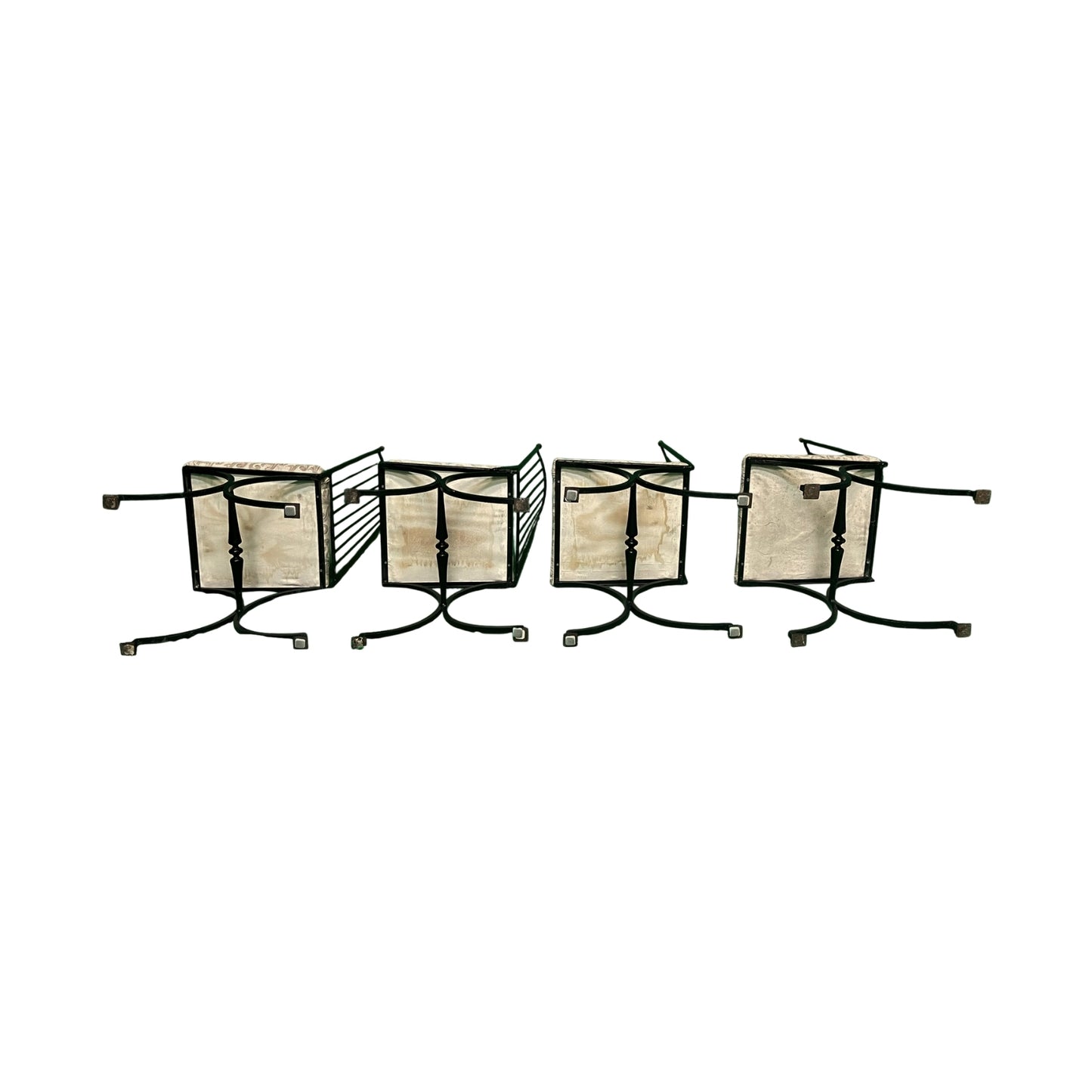 Bottom view of set of four iron chairs