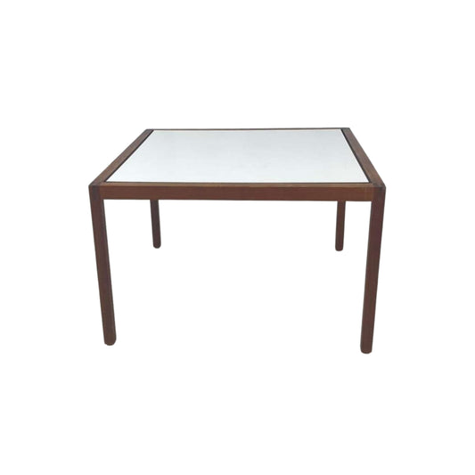 Top view of walnut Knoll side table and laminate on white background