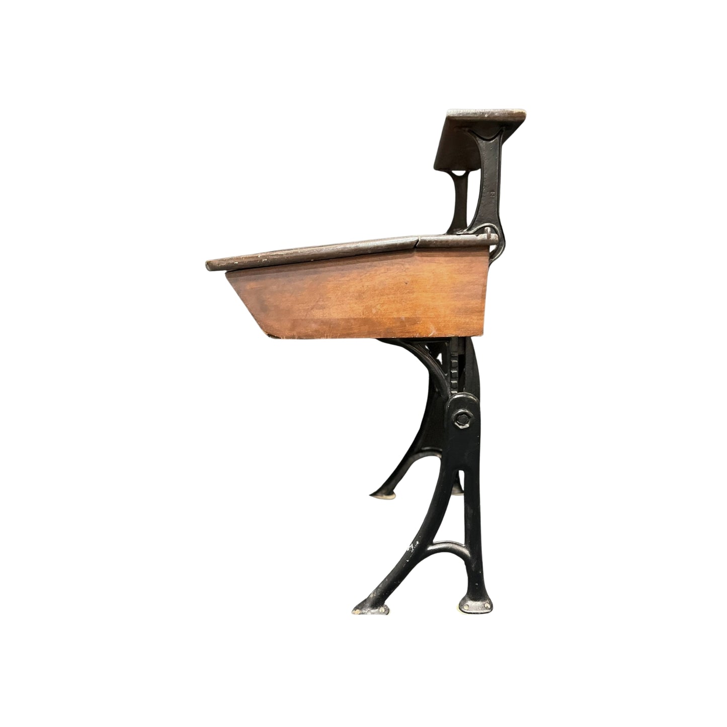 Side view of a vintage wooden child school desk