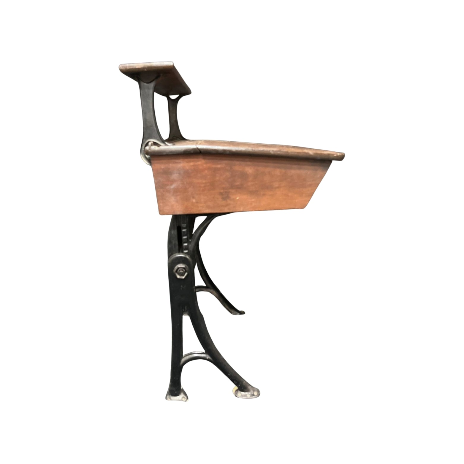 Side view of a vintage wooden child school desk