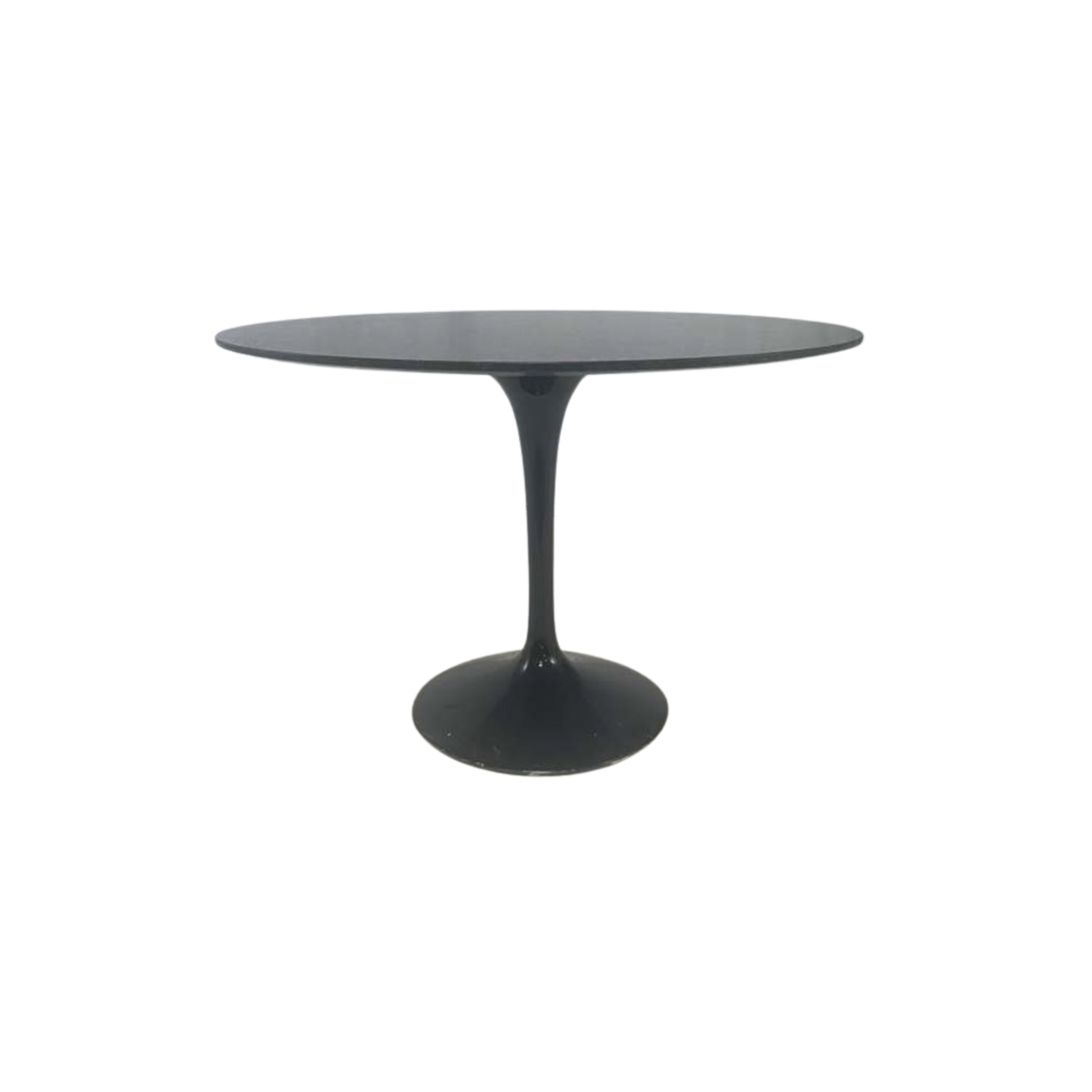 Front view of a black round granite table on a white background