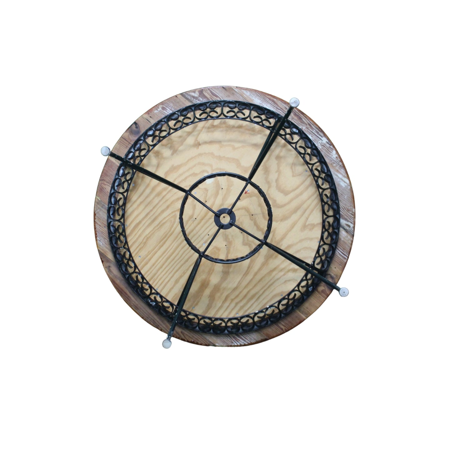 Bottom view wooden table on top and wrought iron on white background