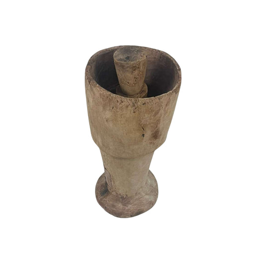 Vintage wooden mortar on a white background