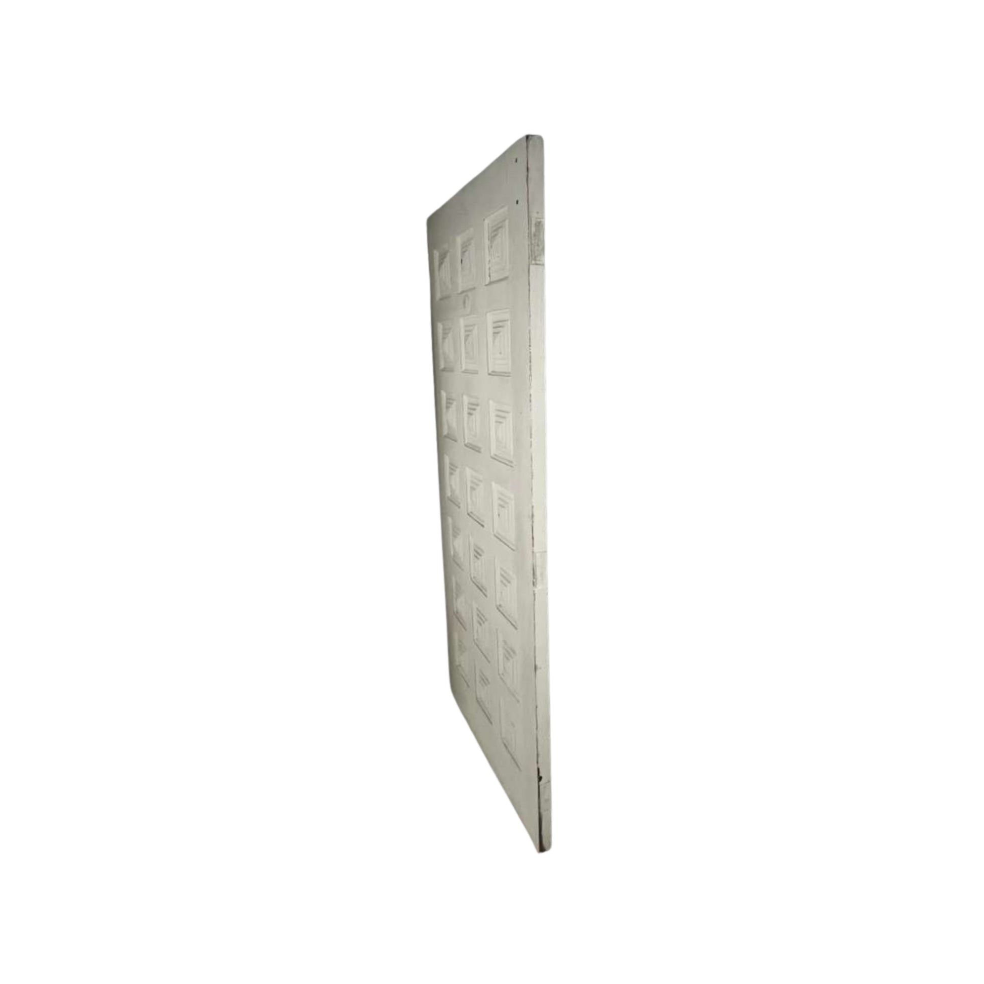 Side view of a mid-Century solid wood door on a white background