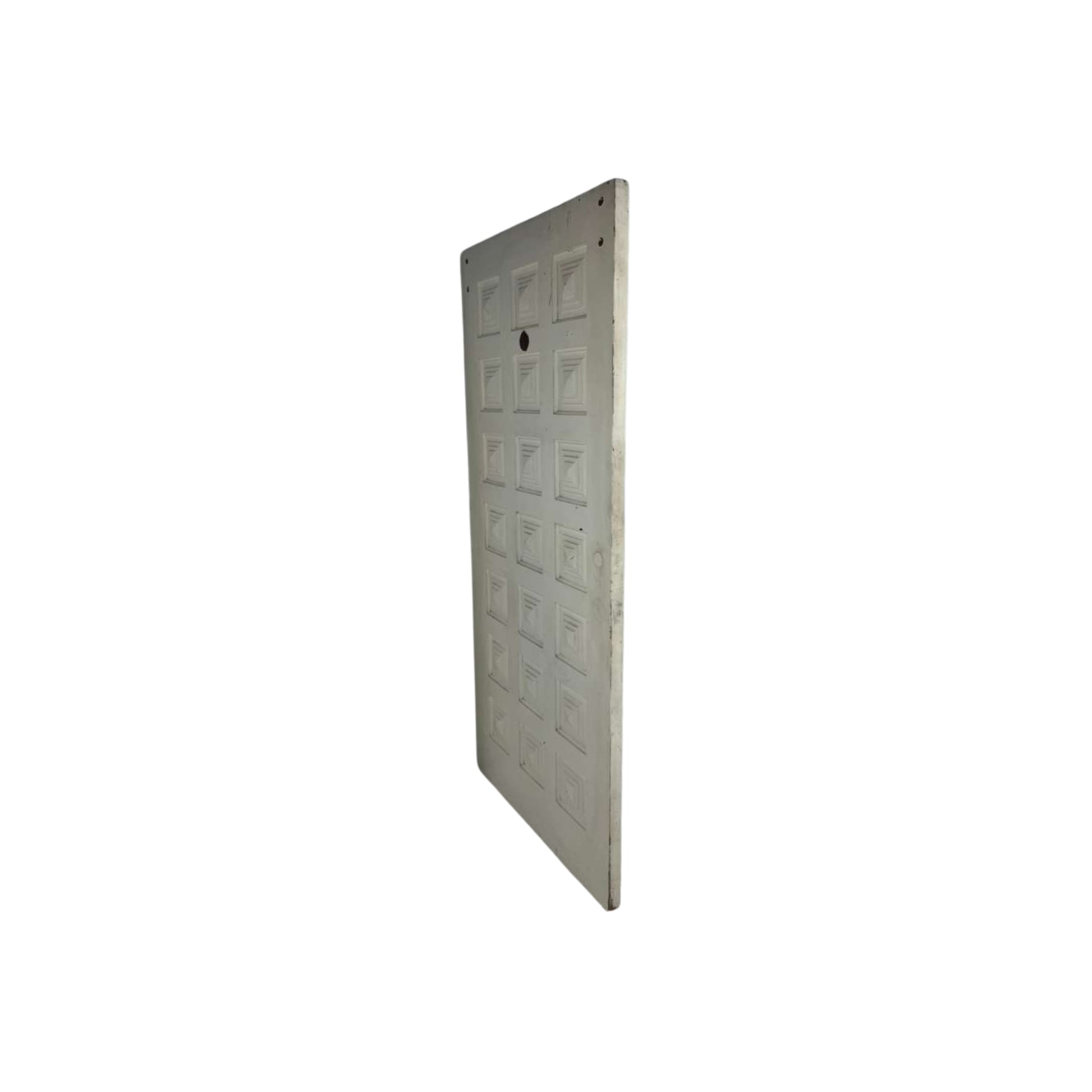Side view of a mid-Century solid wood door on a white background