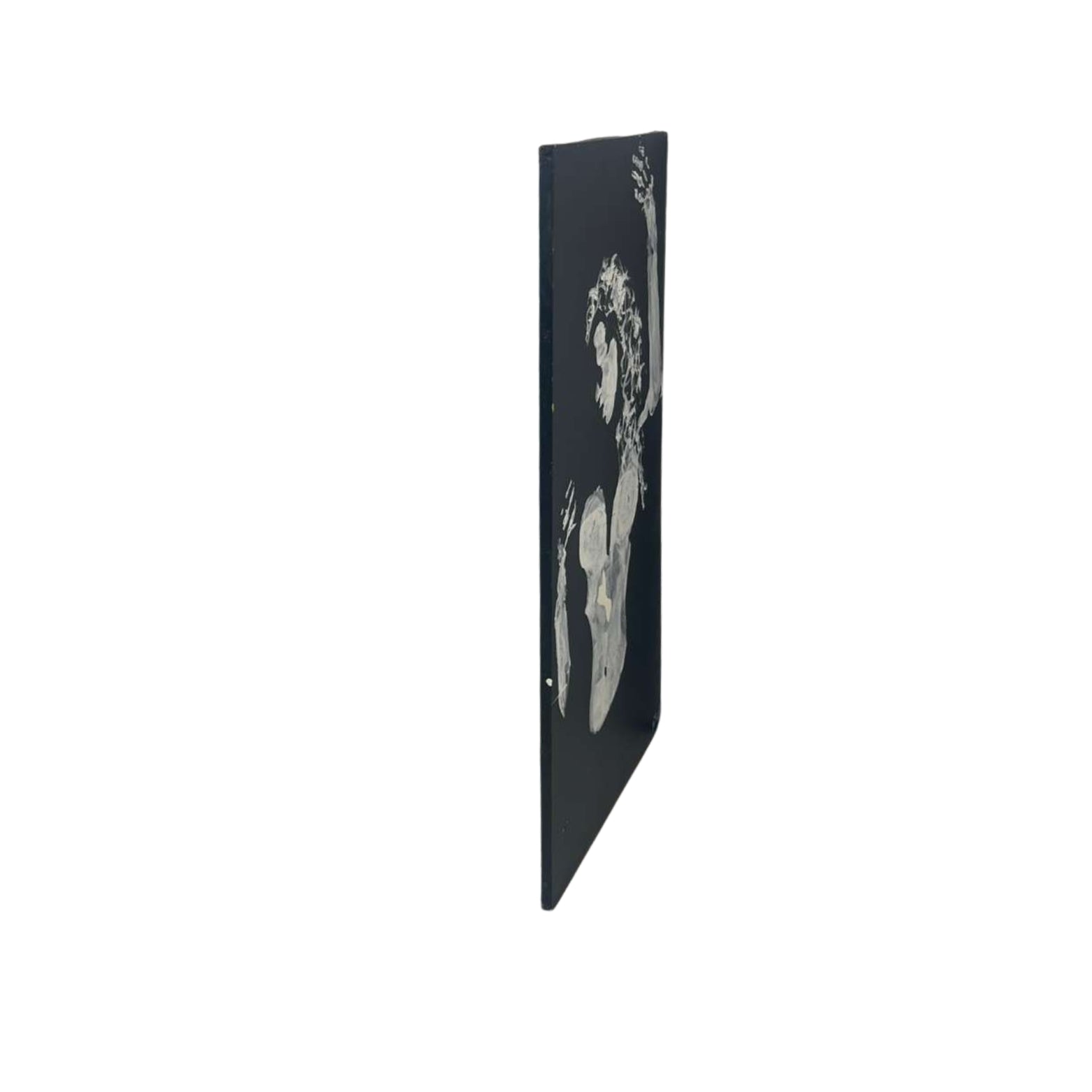Side view of wall art of legs and breasts on a white background