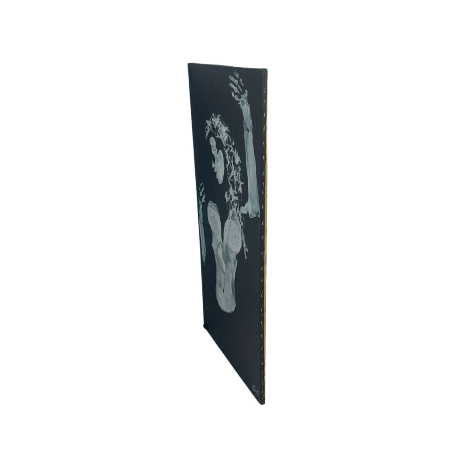 Side view of wall art of legs and breasts on a white background