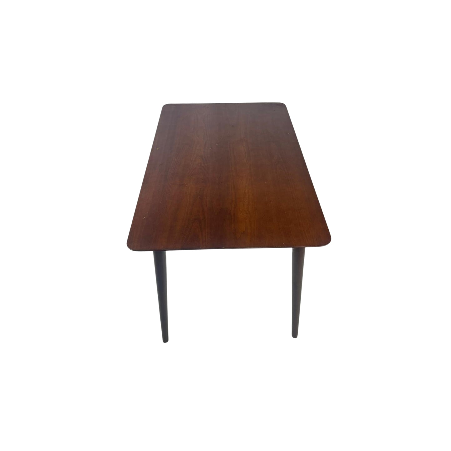 Side view of a rectangular wooden table on a white background