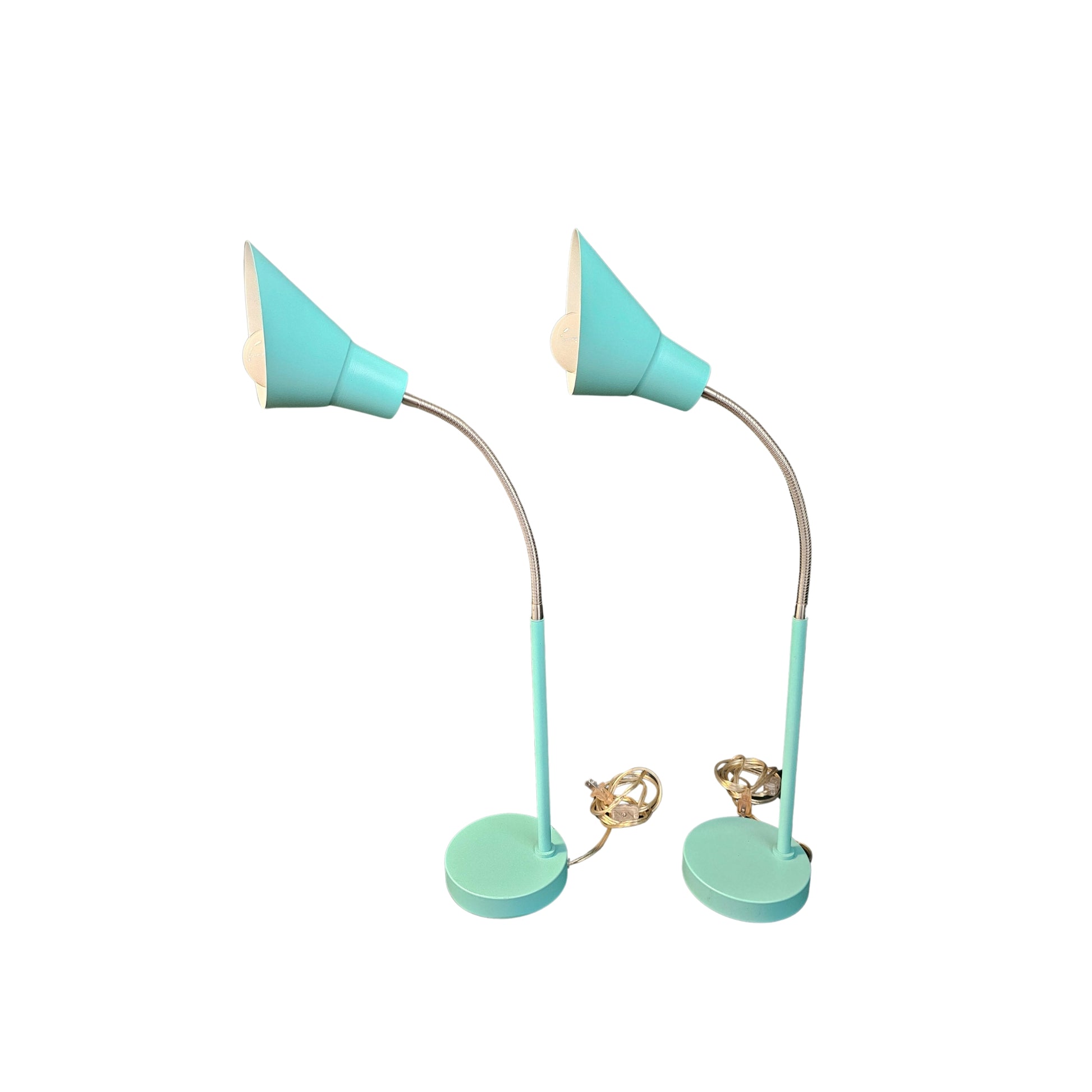 Unleash your inner risk-taker with the MCM Retro style able Lamps in Turquoise Teal, set of 2. These bold, vintage-inspired lamps add a touch of adventure to any room with their vibrant color and sleek design. Elevate your space and make a statement with these retro beauties. set of 2, $41.00 each