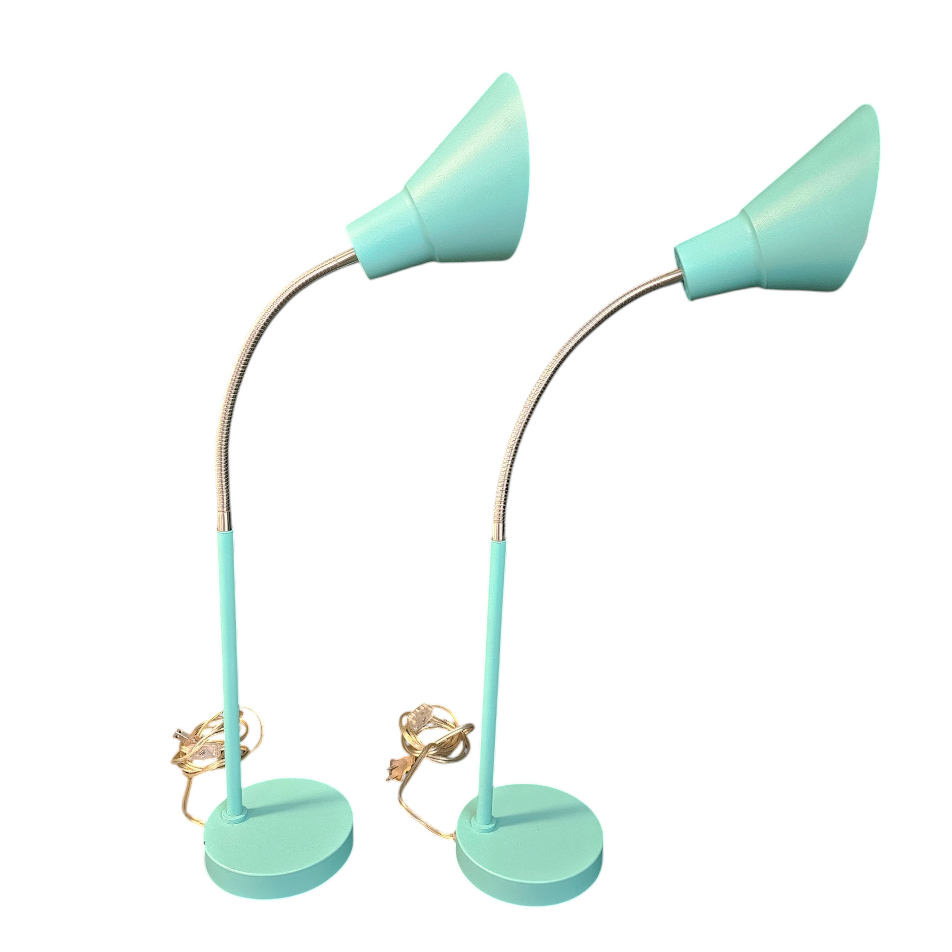 Unleash your inner risk-taker with the MCM Retro style able Lamps in Turquoise Teal, set of 2. These bold, vintage-inspired lamps add a touch of adventure to any room with their vibrant color and sleek design. Elevate your space and make a statement with these retro beauties. set of 2, $41.00 each