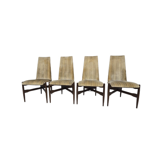 Four wicker chairs on a white background