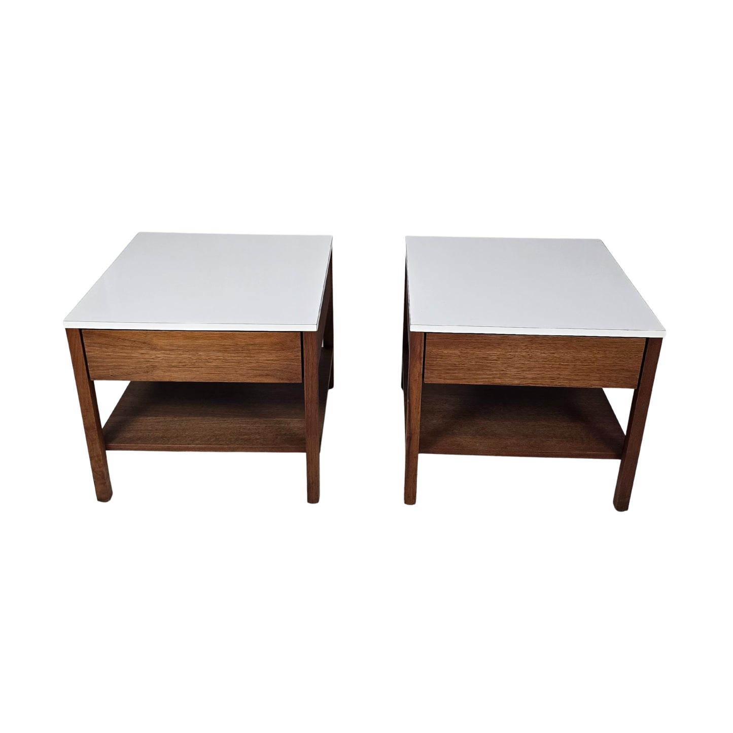 Two wooden side tables with white tops on a white background