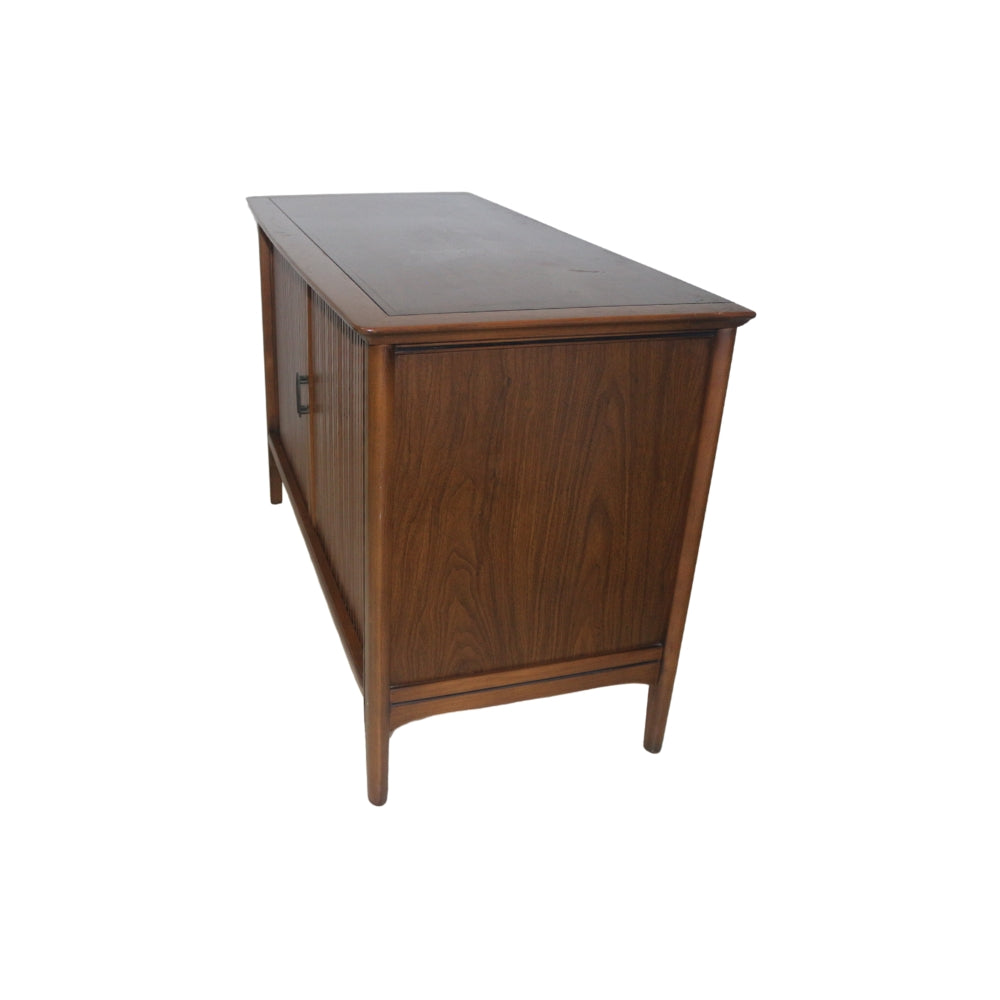 This Mid-Century Magnavox TV Console with Tambour Wood Doors is an eye catcher and a great conversation starter. Circa Mid 20th Century is very well preserved 