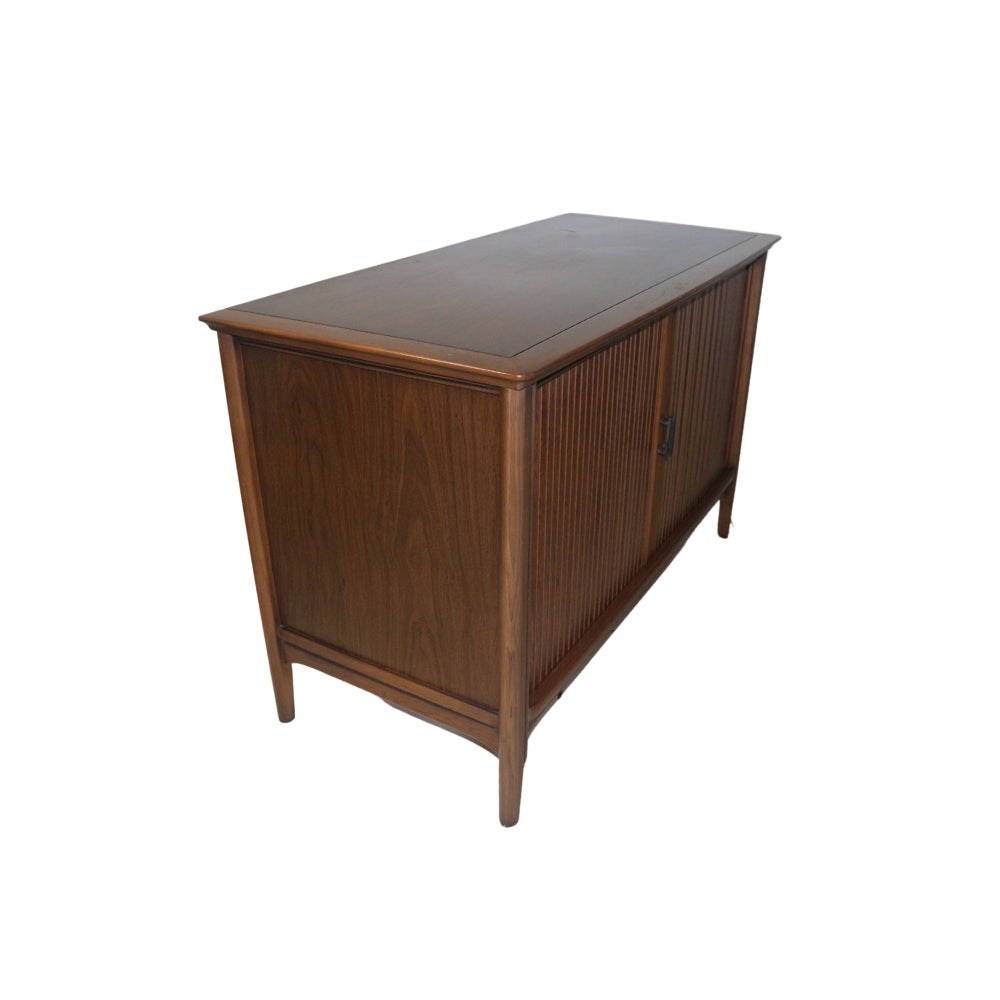 This Mid-Century Magnavox TV Console with Tambour Wood Doors is an eye catcher and a great conversation starter. Circa Mid 20th Century is very well preserved 