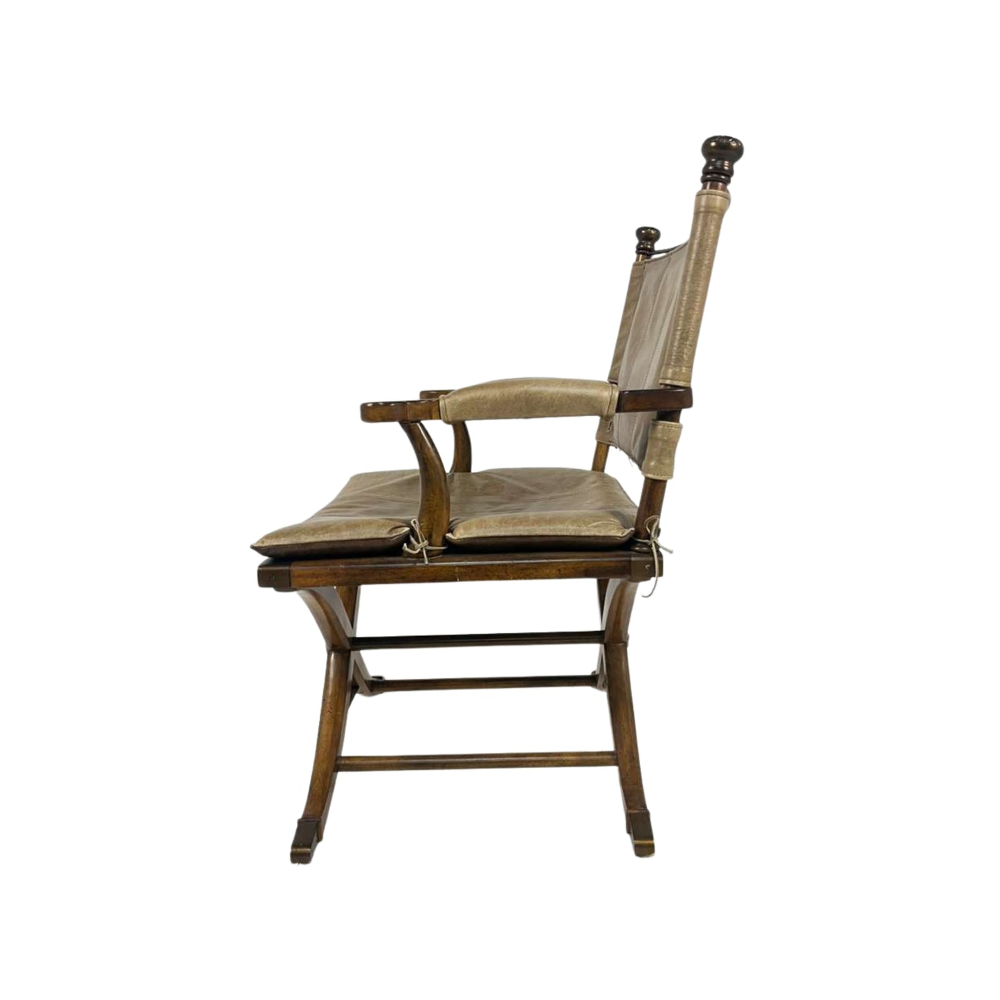 Side view of wooden chair with a cushion 