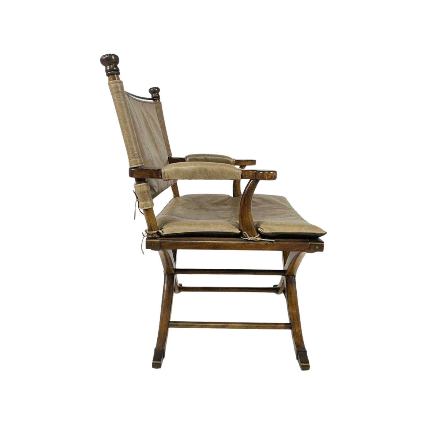 Side view of a wooden chair with a cushioned seat and backrest 