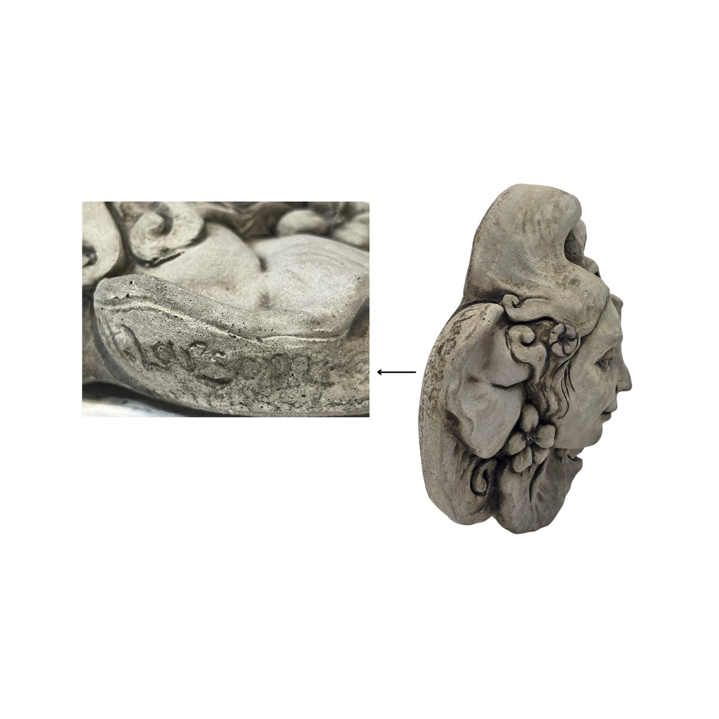 Detail of the artist's signature on the decorative stone wall plaque with face and floral design on white background