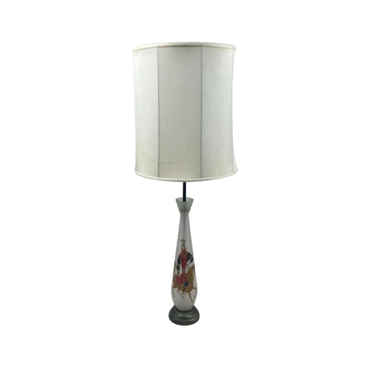 View of a table lamp with a design printed of a knight on horseback on a white background