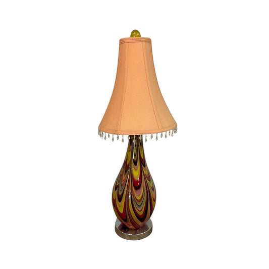 Travel back in time to the early 1900s with this Art Deco Italian blown glass table lamp! The perfect mix of classical elegance and modern style, it will add a touch of whimsy to any room.